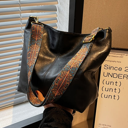 Chic tygväska med dekorerade remmar - Hildur