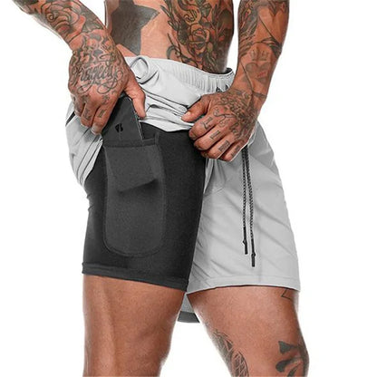 Sportkläder dubbeldäckade löparshorts - Kevin