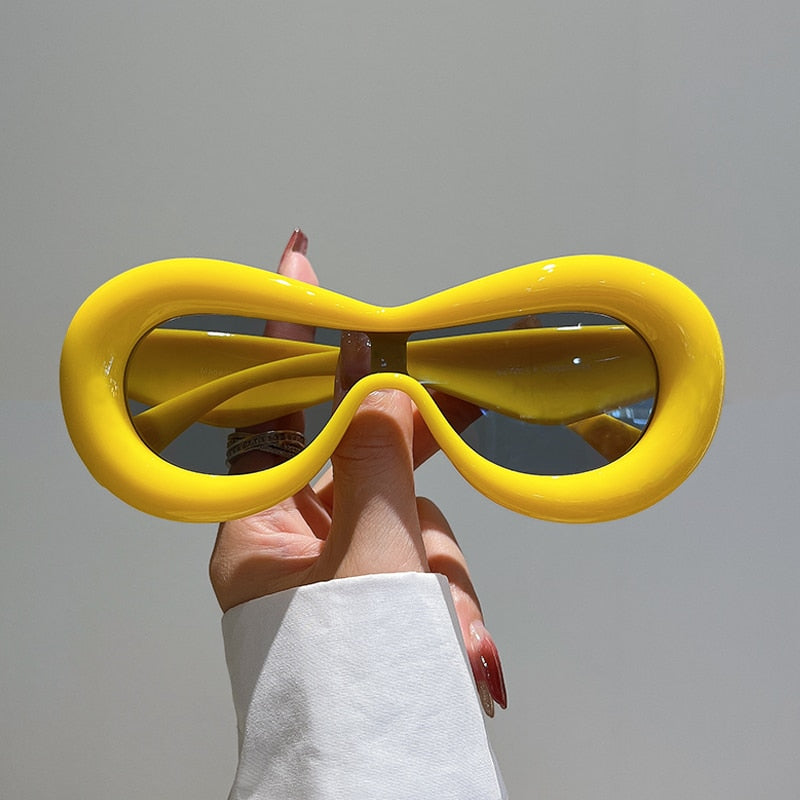 Futuristiska ovala solglasögon med slimmad design -  Marion